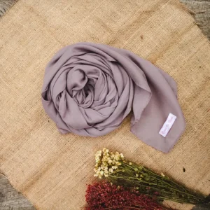 Rose woven scarf — illustrative stock photograph
